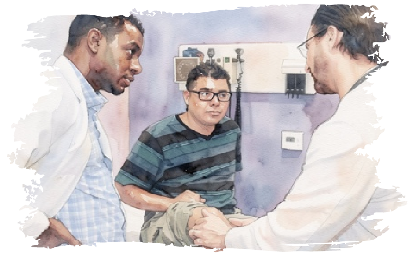 Two doctors consult with a patient about treatment options.